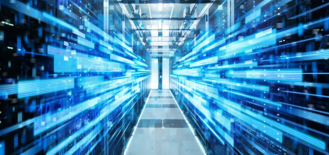 Data center corridor with blue light streaks, representing high-speed data flow, highlighting DNS security, monitoring, and surveillance technologies.