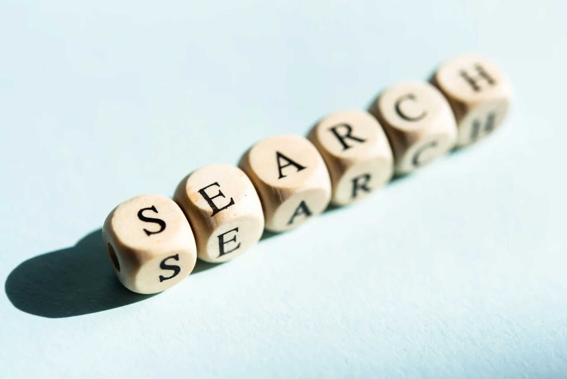 Letter blocks spelling “SEARCH” aligned in a row, representing search visibility, accessibility, and discoverability online.